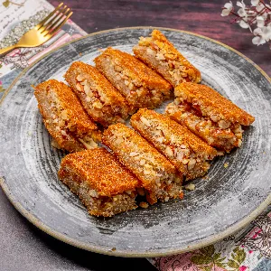 كنافة بصمة بالمكسرات والزبيب